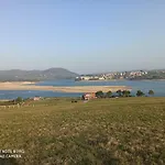 En Playa Robayera Дом отдыха Могро